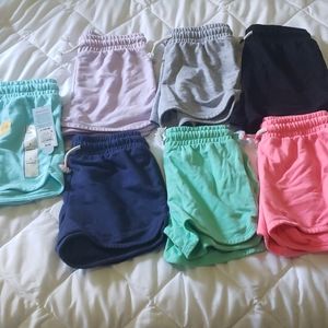 7 pair Cat & Jack dolphin shorts